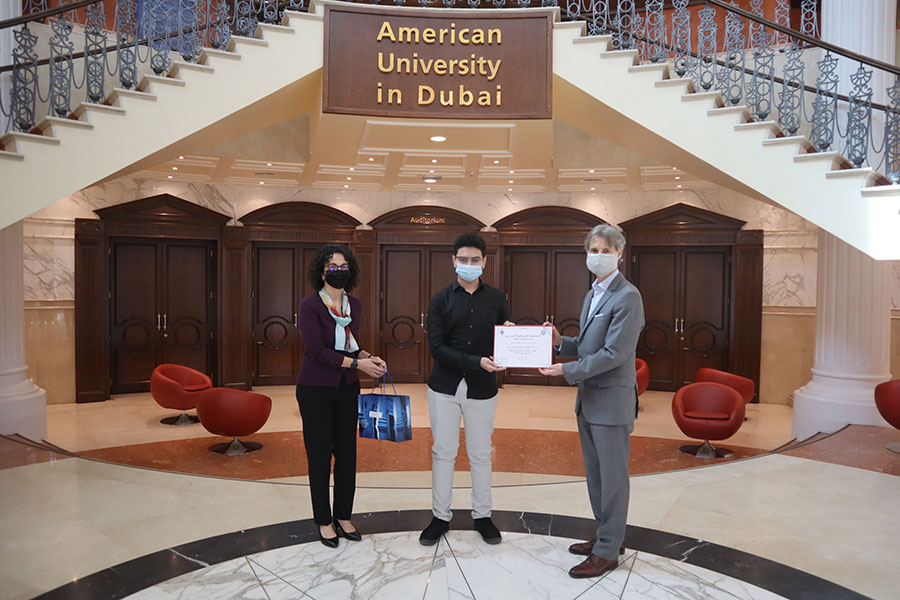 Dr. David A. Schmidt, Dr. Sabrina Joseph presented the first place award to Abdullah Daoud Ali Ahmed